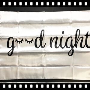 White colorfast silky satin material pillow case. (20in X 30in).